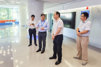 上海市工商业联合会与上海实业 携手共促上海经济繁荣